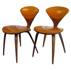 A pair of Norman Cherner upholstered side chairs circa 1960