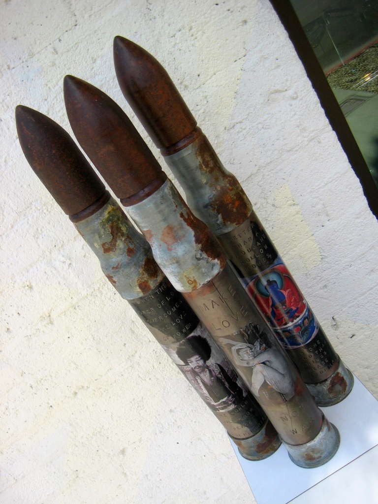 American Provocative Trio of Dummy Artillery Shells with Non-Violent Credo and Imagery