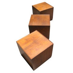 Three walnut cube form side/coffee tables.