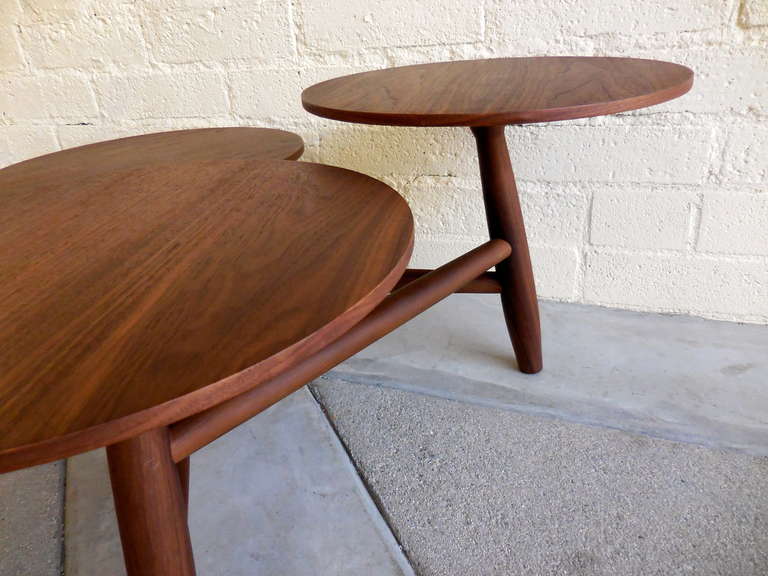 An engaging walnut coffee table with multi-level pod surfaces.  C. 1960's 1
