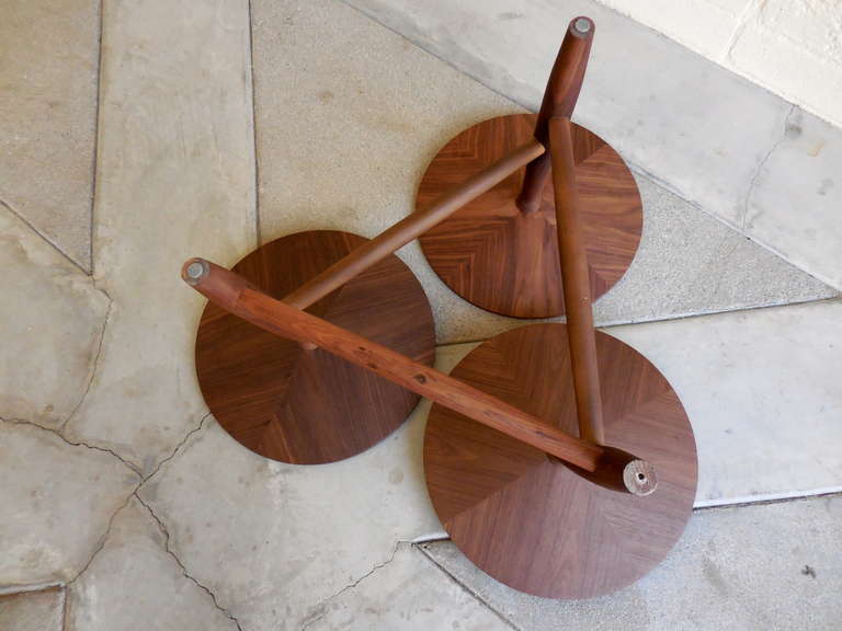 An engaging walnut coffee table with multi-level pod surfaces.  C. 1960's 2