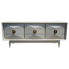 A large nine drawer chest in the style of Monteverdi Young