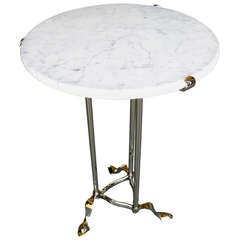 A 1980
s carrara topped nickel plated brass occasional table by Chapman
