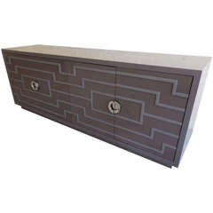 A Chic and Geometrically Graphic Lacquered Four Door Cabinet, circa 1980's