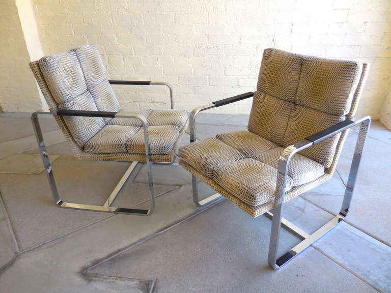 A pair of 1970's club chairs with new 