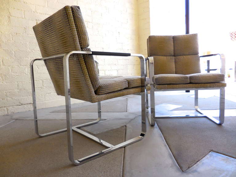 Steel A pair of 1970s club chairs with 