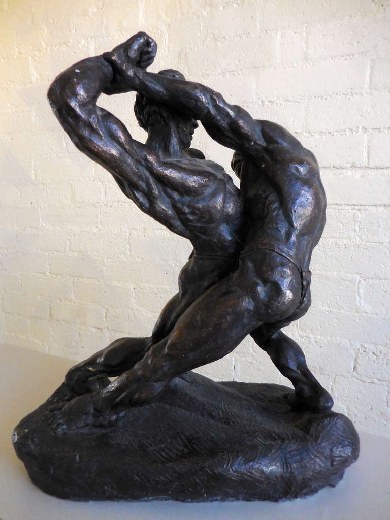 A large and impressive sculpture of wrestlers by Thomas Holland.  C. 1960's