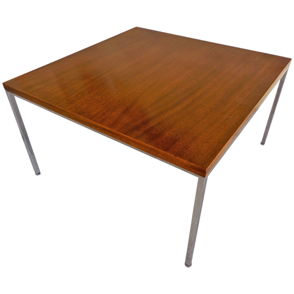 A 1950's mahogany and chromed steel low table by Harvey Probber