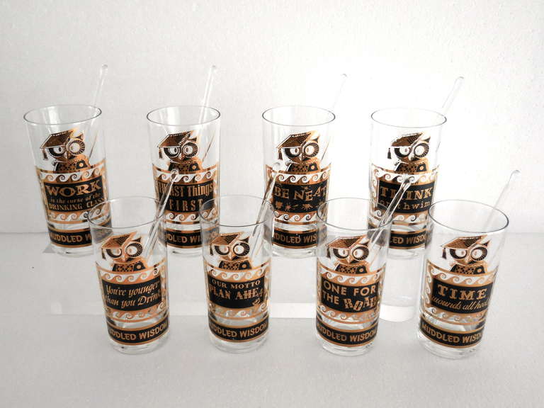 A very clever set of 8 vintage 1950's glass tumblers with 22k gold decoration.  These 8 glasses comprise a set titled 