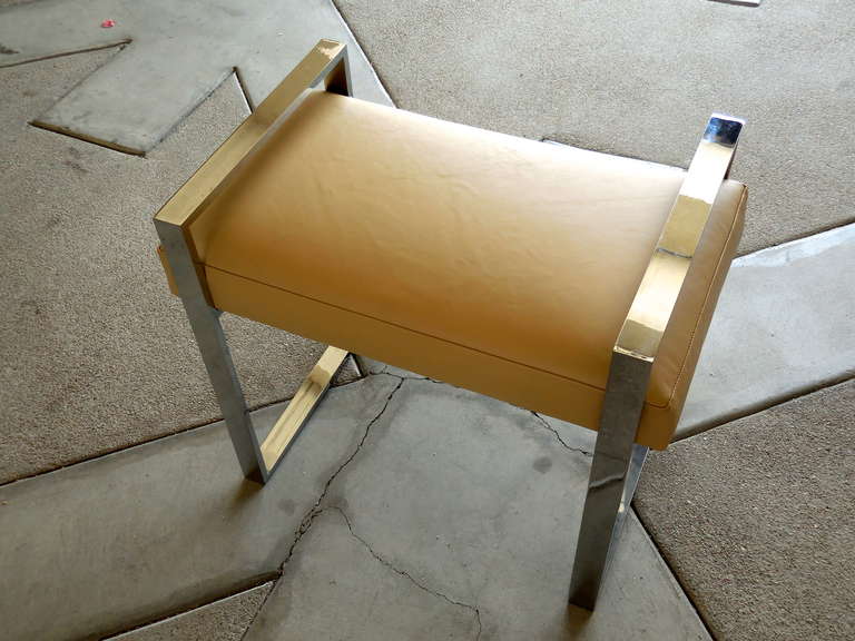 A chrome plated steel rectangular bench from the Box Line designed by Charles Hollis Jones in the 1960's for Hudson-Rissman.  This piece was produced around 1970 and retains its original plating on the metal.  The seat of the bench has just been