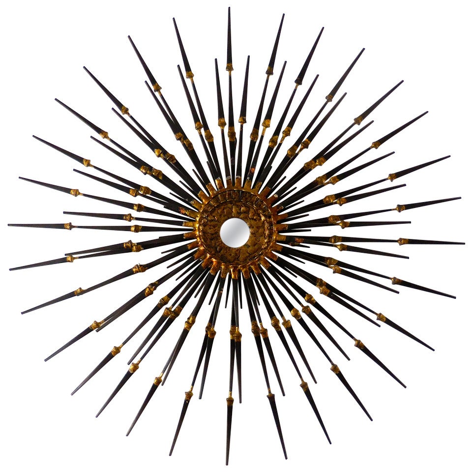 Dynamic Radiant Wall Sculpture with Gilded Details and Mirrored Center For Sale