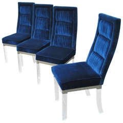 A set of four cobalt velvet upholstered Charles Hollis Jones chairs