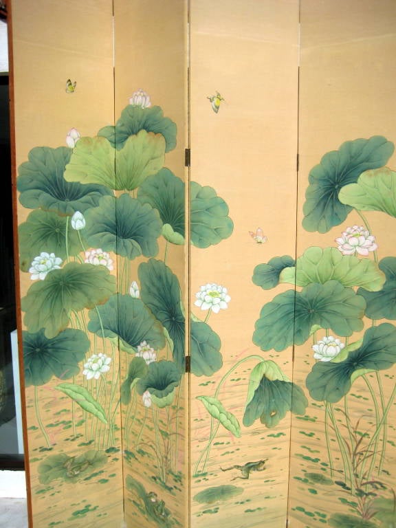 A massive folding-panel hand painted Lotus Screen or 