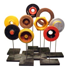 A group of nine wooden foundry mold sculptures