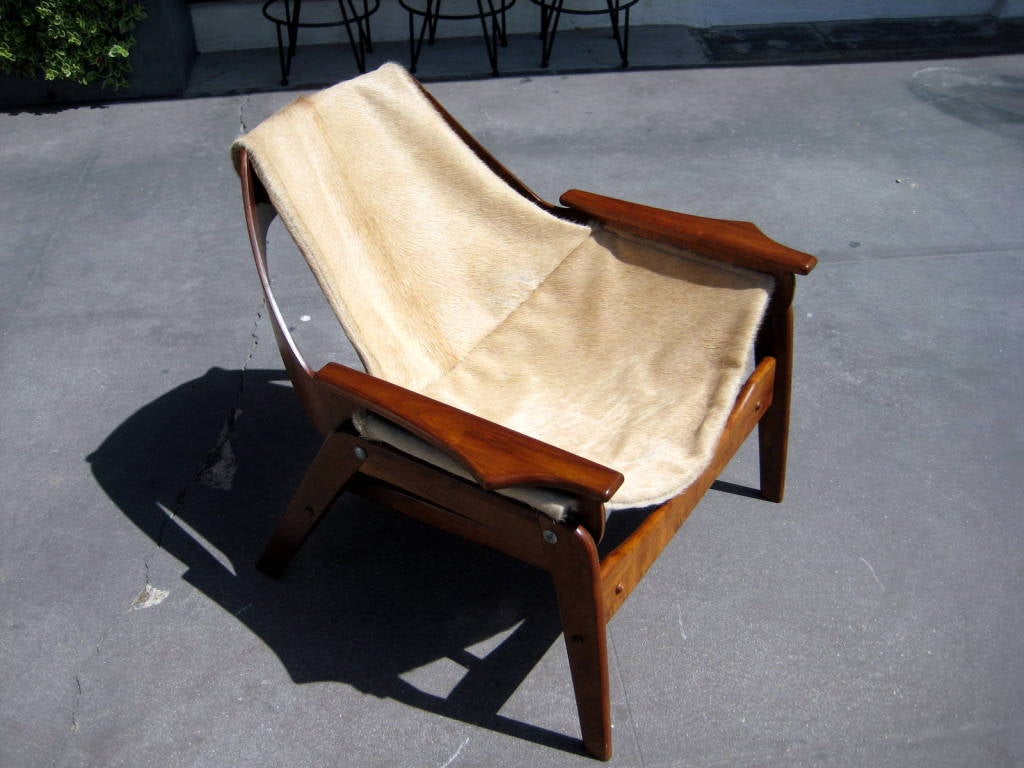 American A walnut sling chair designed by Jerry Johnson in 1964