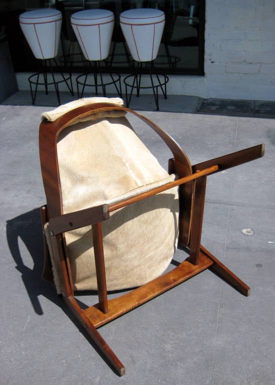 A walnut sling chair designed by Jerry Johnson in 1964 1