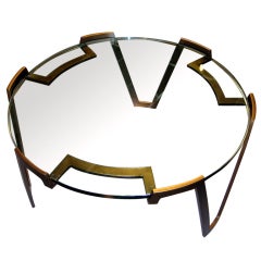 An enameled steel coffee table in the style of Jean Royere