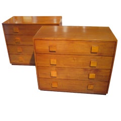 A pair of 1940's fruitwood chests with square drawer pulls