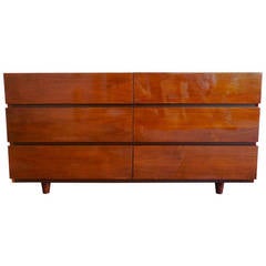 A Six Drawer Piano Finish Lacquered Walnut Chest of Drawers C.1960's