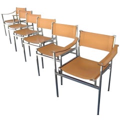 A set of six Italian leather and steel sling chairs c. 1960's