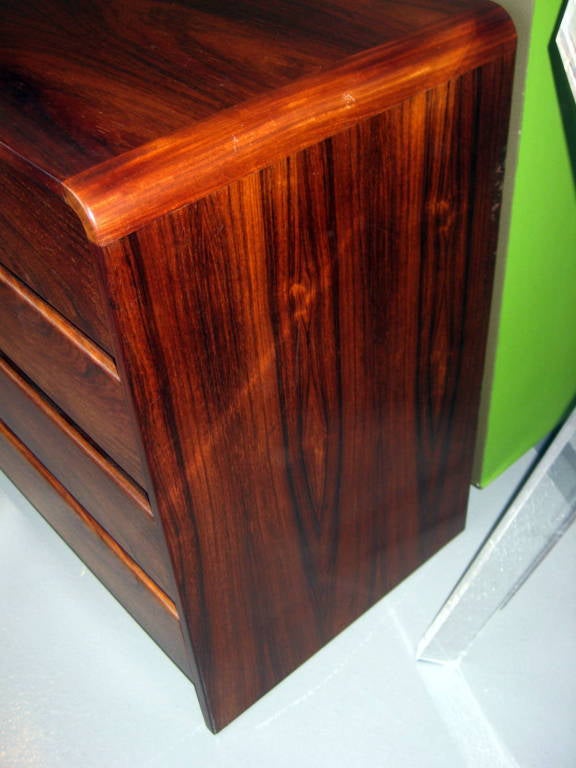 A 1970's bookmatched rosewood 8 drawer chest with waterfall edge 3