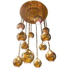 Exotic 1950's Polished Brass Moroccan 12 Pendant Hanging Fixture