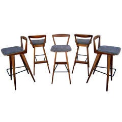 A set of five Rosengren Hansen walnut stained teak bar stools c. 1960's.