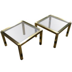A pair of brass low tables made by Mastercraft