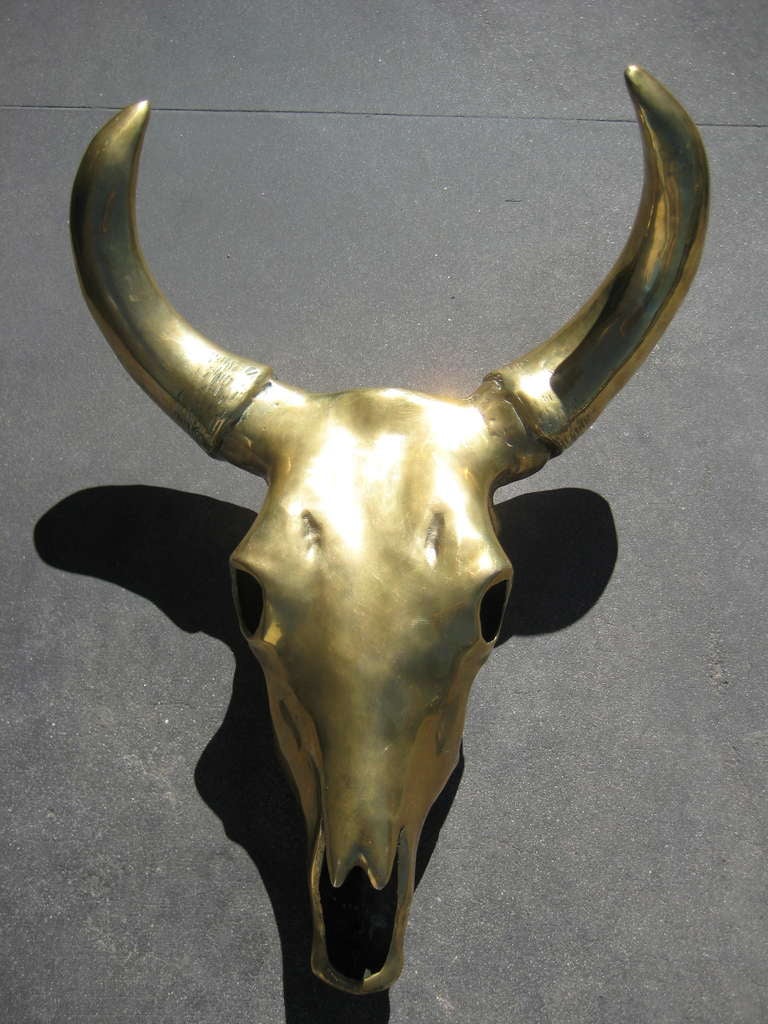 A large scale solid polished brass sculptural cow skull c.1970's 1