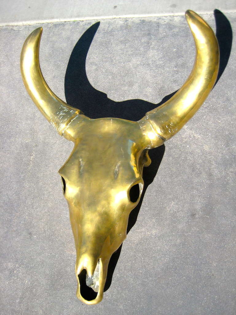 A large scale solid polished brass sculptural cow skull c.1970's 2