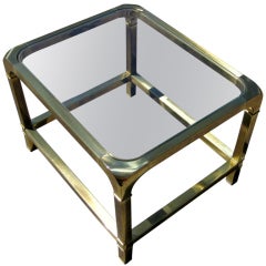 A rectangular brass side table by Mastercraft