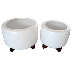 Retro A duo of rolled edge Architectural Pottery planters on wooden stands. C 1960's.