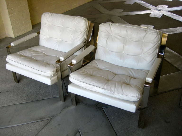 American Pair of White Leather Lounge Chairs by Cy Mann