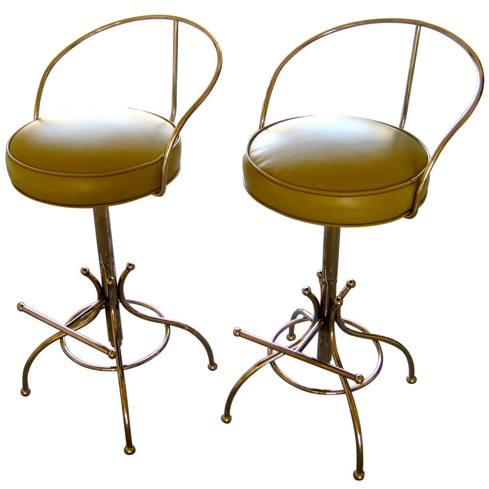A pair of nickel plated steel bar stools manufactured by Hudson-Rissman C. 1965