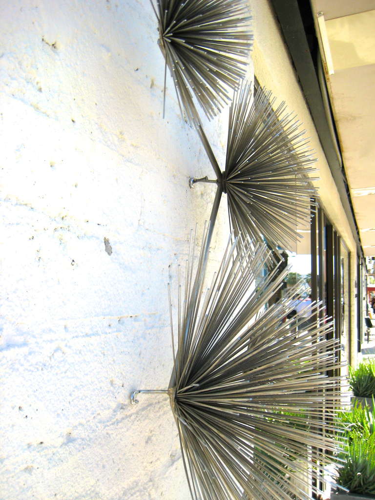 A Chrome Pom Pom/sea Urchin Wall Sculpture By Curtis Jere C. 1970's In Excellent Condition In Palm Springs, CA