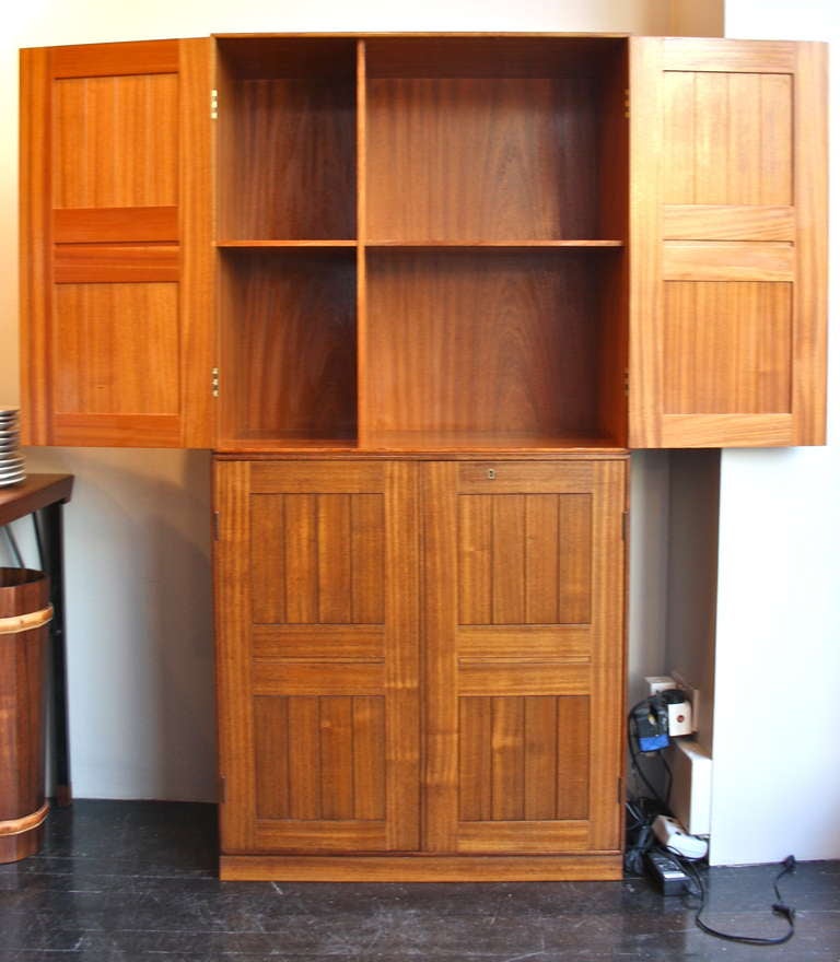 Set of four cabinets and two plinths in great quality Mahogany cabinets designed by Mogens Koch and made by master cabinetmakers Rud Rasmussen.