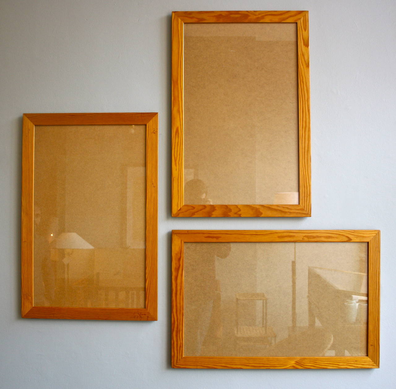 Individual large pine frames designed by Mogens Koch and made by Rud Rasmussen Snedkerier. Great color to the wood.