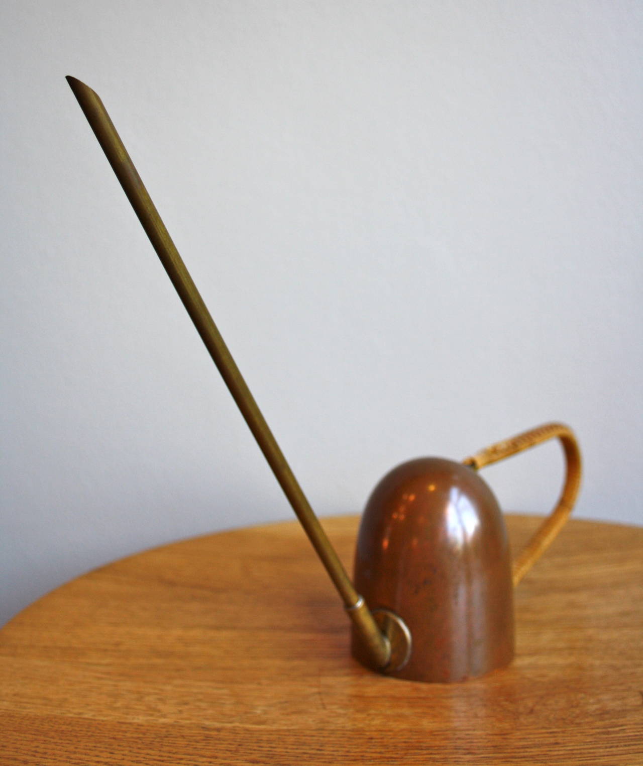 small copper watering can