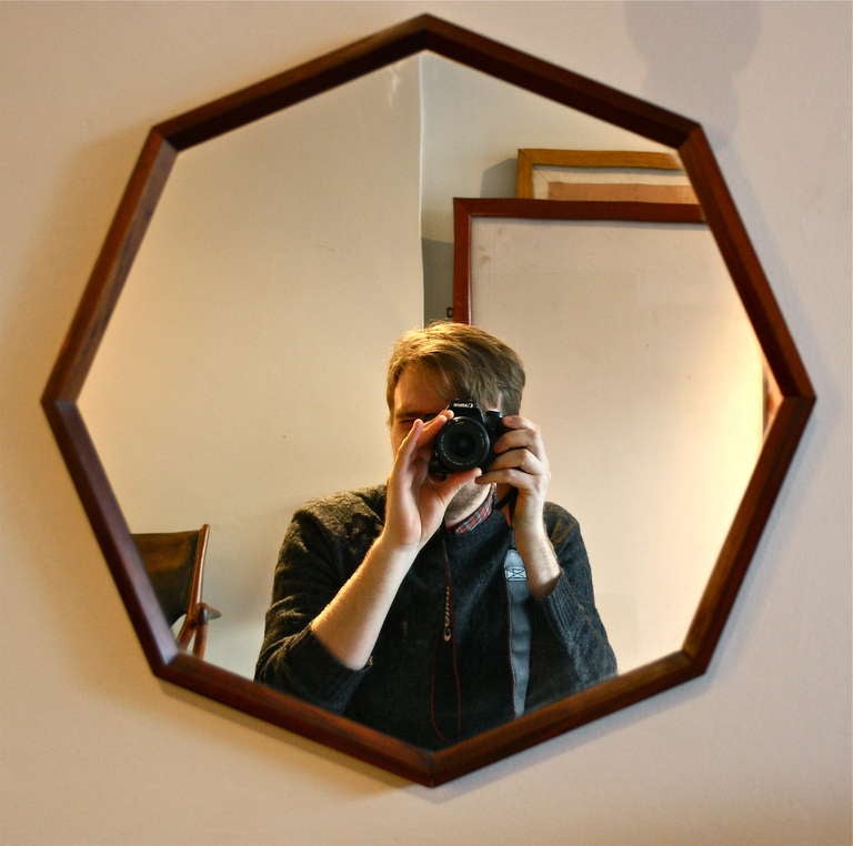 Lovely quality Octagonal wallmounted mirror from an individual cabinetmaker based in Denmark. Beautiful craftsmanship with gorgeous Rio rosewood.