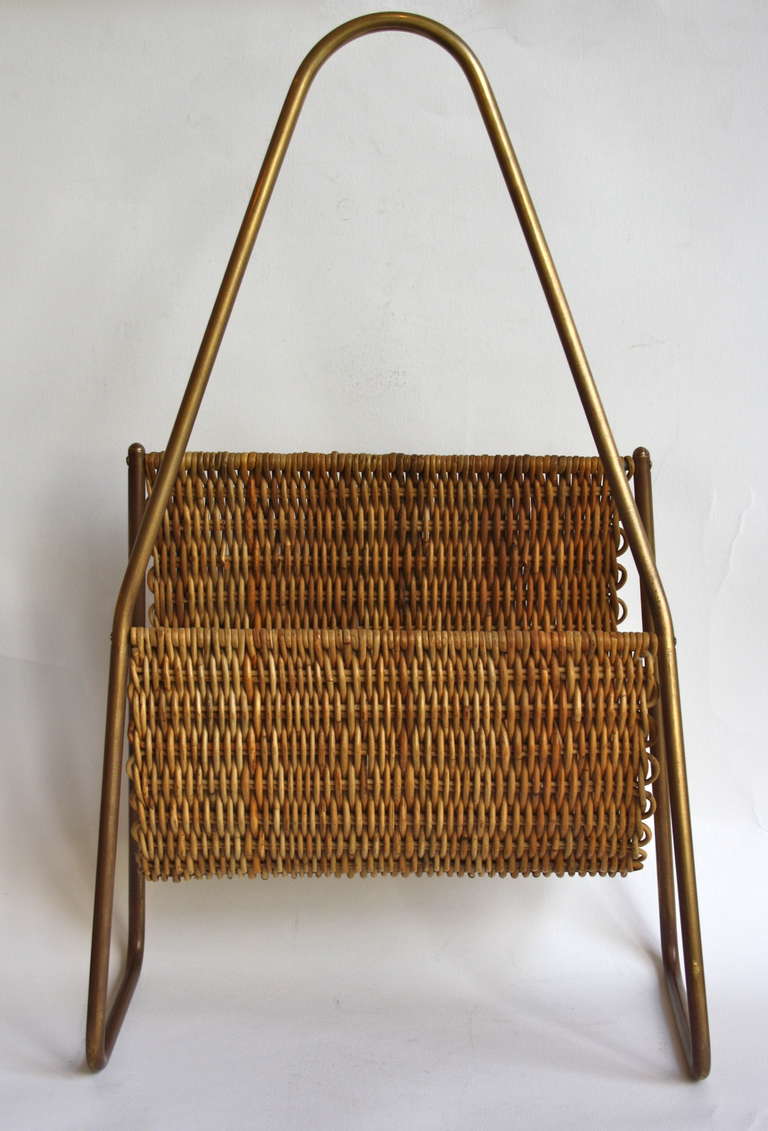Strong wicker magazine holder with a basket weave, - classic Auböck piece with a difference.