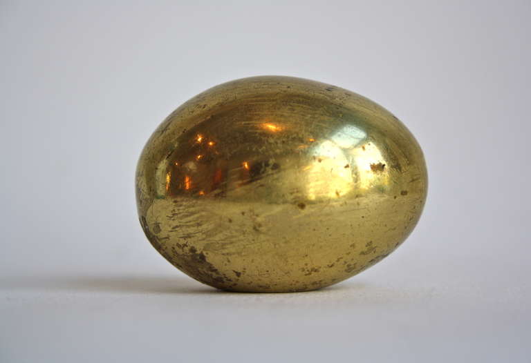 The classic Egg by Auböck , favoured by Walter Gropius, - he kept one on his desk throughout his life.  As lovely to the touch as to look at