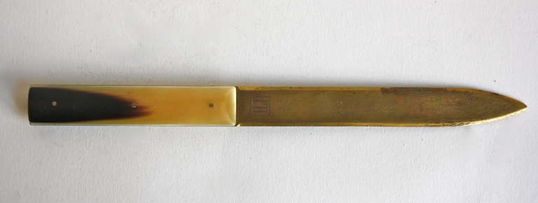 Brass and horn letter opener by the great workshop. Great condition