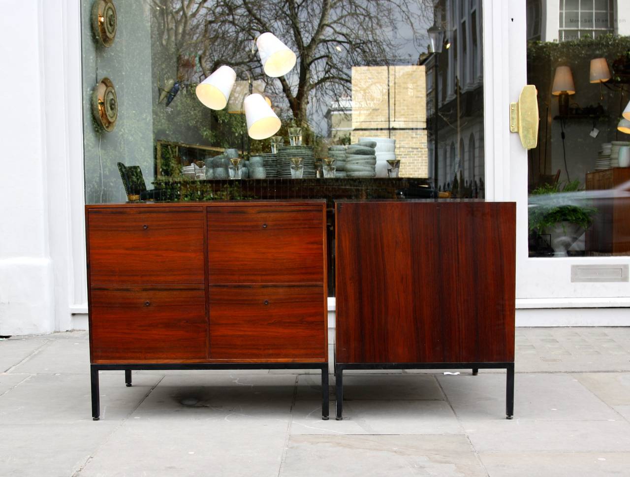 Pair of chests of drawers by Mogens Koch, originally designed and made for a jewelry shop in Aarhus, Denmark. 
Rosewood and oak on a black painted metal base, all in great quality.