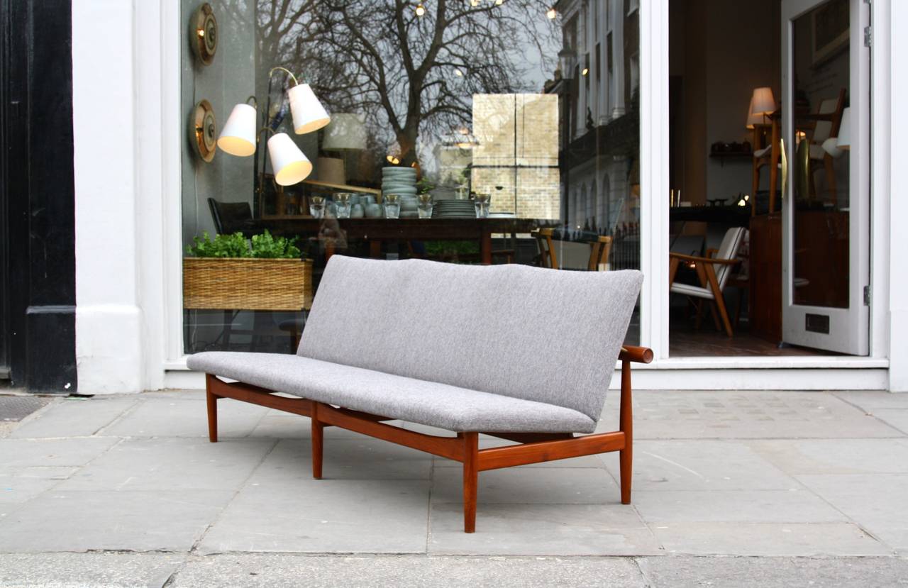 Three seater sofa by Finn Juhl and made by France & France. Newly re upholstered and in overall great condition.