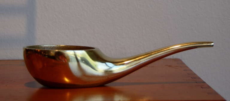 Great heavy piece in the largest possible size by Carl Aubock.  Pun on the use, the shape is almost a pipe...