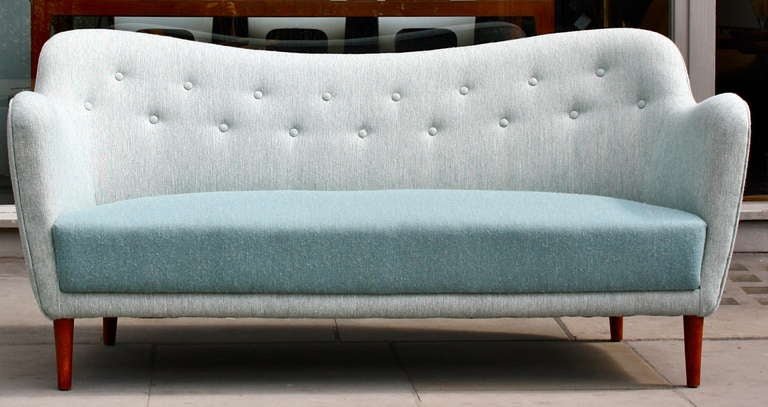 2 1/2 Seater Poet sofa by Finn Juhl. Made by Bovirke with a sprung base and sides it is very comfortable and does despite the 2 1/2 name sit 3 people easily. Classic Finn Juhl in great condition.