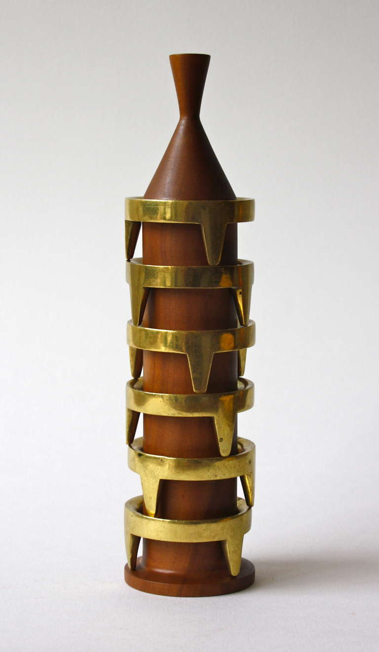 The tower of eggcups designed and made by Carl Auböck.  Solid Walnut stem and individual cast brass eggcups.