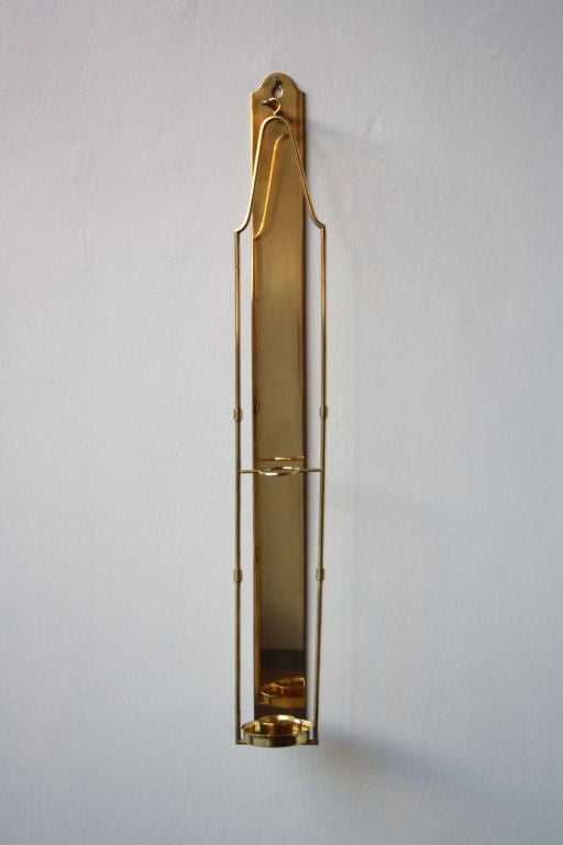 Two part wall mounted brass candleholder made in Denmark in the 1950s possibly by Torben Oerskov