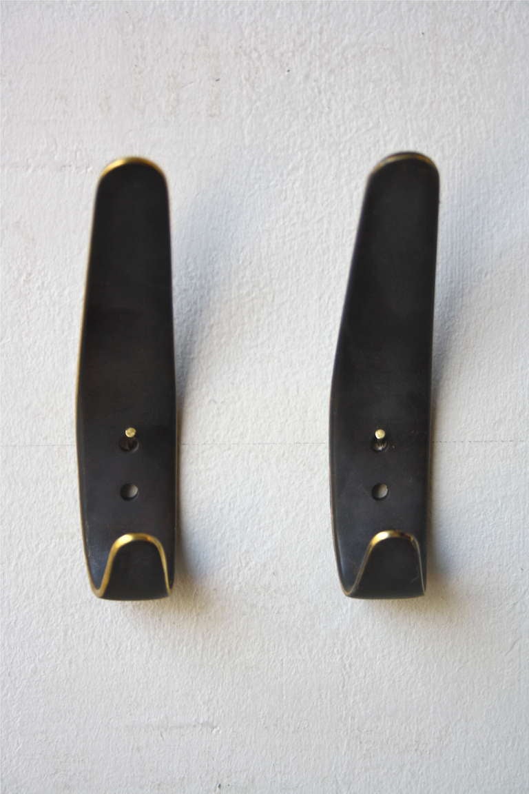Beautiful pair of Patinated Brass Hooks by Carl Auböck