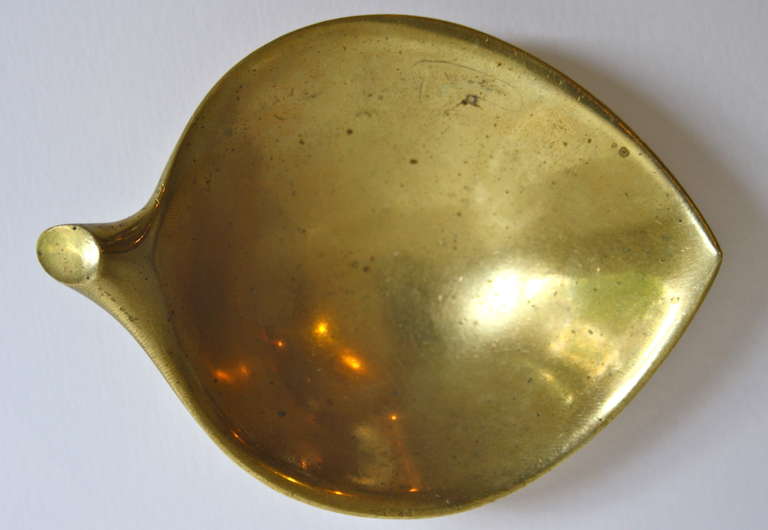 Wonderful sculptural piece in heavy sand cast brass by Auböck and his tiny workshop.